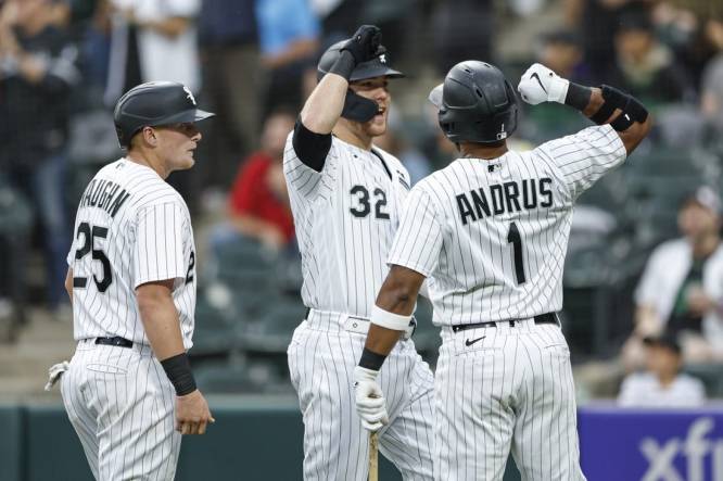 Sep 16, 2023; Chicago, Illinois, USA; Chicago White Sox right fielder Gavin Sheets (32) celebrates with shortstop Elvis Andrus (1) after hitting a three-run home run against the Minnesota Twins during the first inning at Guaranteed Rate Field. Mandatory Credit: Kamil Krzaczynski-USA TODAY Sports