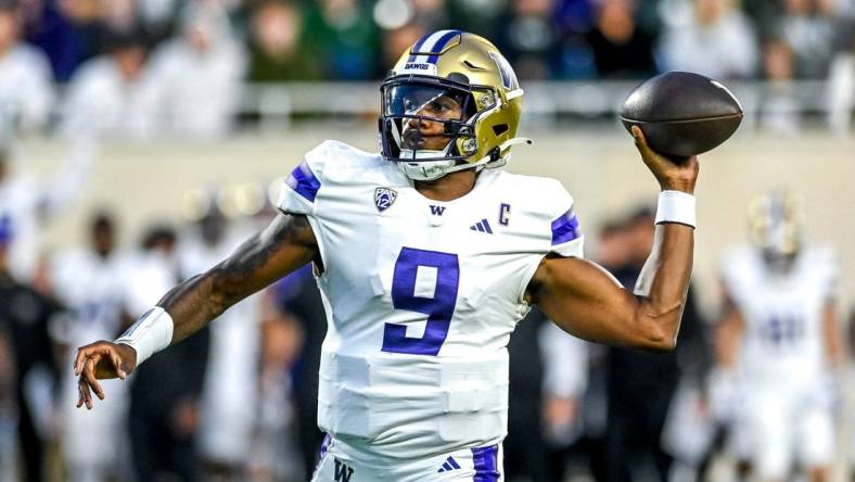 Washington quarterback Michael Penix Jr. throws a pass against Michigan State during the third quarter on Saturday, Sept. 16, 2023, at Spartan Stadium in East Lansing.