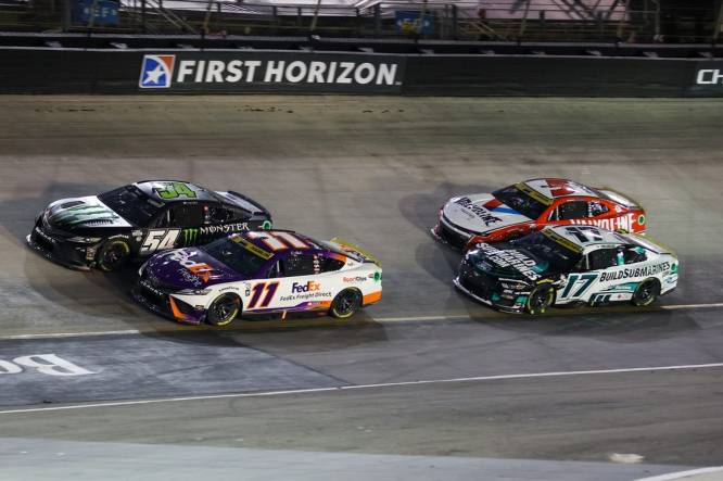 Sep 16, 2023; Bristol, Tennessee, USA; NASCAR Cup Series driver Ty Gibbs (54) and driver Denny Hamlin (11) during the Bass Pro Shops Night Race at Bristol Motor Speedway. Mandatory Credit: Randy Sartin-USA TODAY Sports