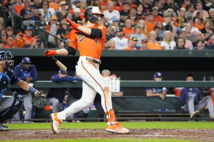 Sep 16, 2023; Baltimore, Maryland, USA; Baltimore Orioles shortstop Gunnar Henderson (2) hits an RBI single against the Tampa Bay Rays during the fourth inning at Oriole Park at Camden Yards. Mandatory Credit: Gregory Fisher-USA TODAY Sports