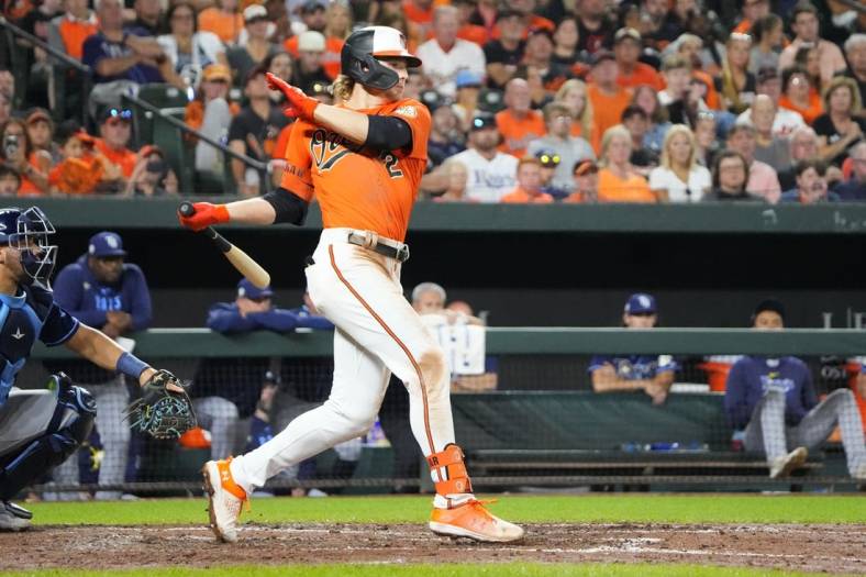 Sep 16, 2023; Baltimore, Maryland, USA; Baltimore Orioles shortstop Gunnar Henderson (2) hits an RBI single against the Tampa Bay Rays during the fourth inning at Oriole Park at Camden Yards. Mandatory Credit: Gregory Fisher-USA TODAY Sports