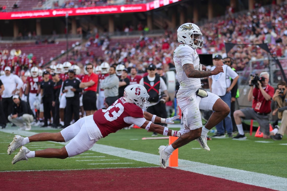 Sep 16, 2023; Stanford, California, USA; Sacramento State Hornets quarterback Kaiden Bennett (1) runs for a touchdown past Stanford Cardinal safety Alaka'i Gilman (33) during the second quarter at Stanford Stadium. Mandatory Credit: Sergio Estrada-USA TODAY Sports