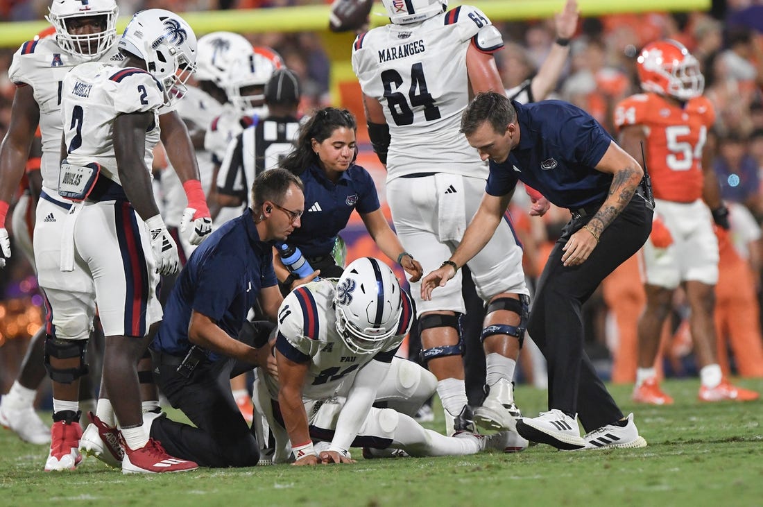 Sep 16, 2023; Clemson, South Carolina; Florida Atlantic quarterback Casey Thompson (11) is hurt in the game with Clemson during the second quarter against Florida Atlantic at Memorial Stadium.  Mandatory Credit: Ken Ruinard-USA TODAY NETWORK