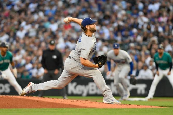 Sep 16, 2023; Seattle, Washington, USA; Los Angeles Dodgers starting pitcher Clayton Kershaw (22) throws against the Seattle Mariners during the first inning at T-Mobile Park. Mandatory Credit: Steven Bisig-USA TODAY Sports