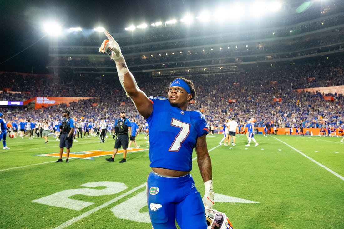 Sep 16, 2023; Gainesville, Florida, USA; Florida Gators running back Trevor Etienne (7) gestures to the crowd at Ben Hill Griffin Stadium after the game against the Tennessee Volunteers. Mandatory Credit: Chris Watkins-USA TODAY Sports