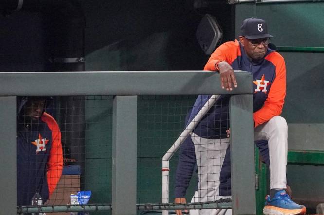 Sep 16, 2023; Kansas City, Missouri, USA; Houston Astros manager Dusty Baker Jr. (12) watches play from the dugout against the Kansas City Royals in the eighth inning at Kauffman Stadium. Mandatory Credit: Denny Medley-USA TODAY Sports