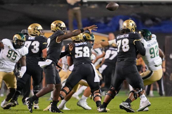 Sep 16, 2023; Boulder, Colorado, USA; Colorado Buffaloes quarterback Shedeur Sanders (2) passes the ball against the Colorado State Rams during the first half at Folsom Field. Mandatory Credit: Andrew Wevers-USA TODAY Sports