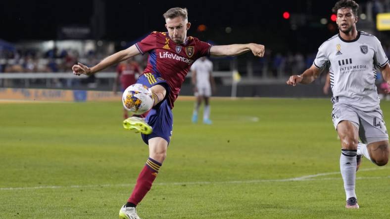 Sep 16, 2023; San Jose, California, USA; Real Salt Lake defender Andrew Brody (center) attempts a shot against the San Jose Earthquakes during the first half at PayPal Park. Mandatory Credit: Darren Yamashita-USA TODAY Sports
