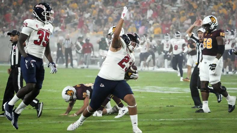 Fresno State Bulldogs defensive lineman Jacob Holmes (23) reacts after recovering a fumble by Arizona State Sun Devils quarterback Drew Pyne (10) in the first half at Mountain America Stadium in Tempe on Sept. 16, 2023.