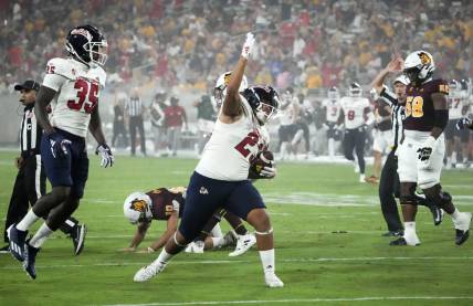 Fresno State Bulldogs defensive lineman Jacob Holmes (23) reacts after recovering a fumble by Arizona State Sun Devils quarterback Drew Pyne (10) in the first half at Mountain America Stadium in Tempe on Sept. 16, 2023.