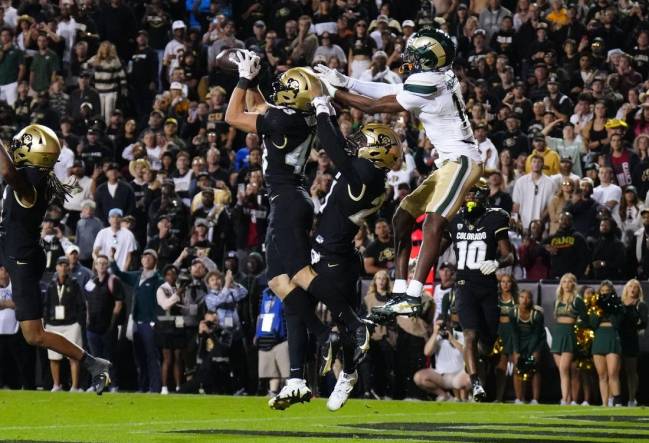 Sep 16, 2023; Boulder, Colorado, USA; Colorado Buffaloes safety Trevor Woods (43) intercepts the ball to end the double overtime game against the Colorado State Rams at Folsom Field. Mandatory Credit: Ron Chenoy-USA TODAY Sports