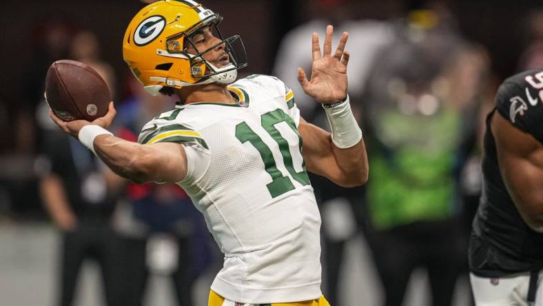 Sep 17, 2023; Atlanta, Georgia, USA; Green Bay Packers quarterback Jordan Love (10) passes against the Atlanta Falcons during the first quarter at Mercedes-Benz Stadium. Mandatory Credit: Dale Zanine-USA TODAY Sports