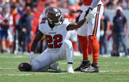 Sep 17, 2023; Tampa, Florida, USA; Tampa Bay Buccaneers running back Chase Edmonds (22) reacts as he gets a first down against the Chicago Bears during the first quarter at Raymond James Stadium. Mandatory Credit: Kim Klement Neitzel-USA TODAY Sports
