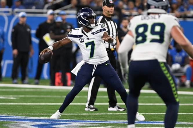 Sep 17, 2023; Detroit, Michigan, USA; Seattle Seahawks quarterback Geno Smith (7) throws a pass against the Detroit Lions in the first quarter at Ford Field. Mandatory Credit: Lon Horwedel-USA TODAY Sports