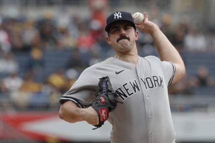 Sep 17, 2023; Pittsburgh, Pennsylvania, USA; New York Yankees starting pitcher Carlos Rodon (55) throws a pitch against the Pittsburgh Pirates during the first inning at PNC Park. Mandatory Credit: Charles LeClaire-USA TODAY Sports