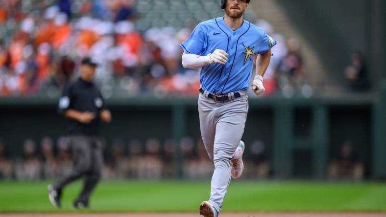 Sep 17, 2023; Baltimore, Maryland, USA; Tampa Bay Rays second baseman Brandon Lowe (8) scores a run during the first inning against the Baltimore Orioles at Oriole Park at Camden Yards. Mandatory Credit: Reggie Hildred-USA TODAY Sports