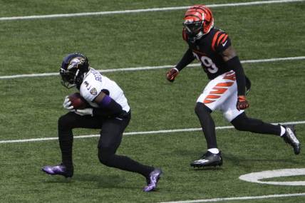Sep 17, 2023; Cincinnati, Ohio, USA; Baltimore Ravens wide receiver Odell Beckham Jr. (3) completes a catch as Cincinnati Bengals cornerback Cam Taylor-Britt (29) defends in the first quarter at Paycor Stadium. Mandatory Credit: Cara Owsley-USA TODAY Sports