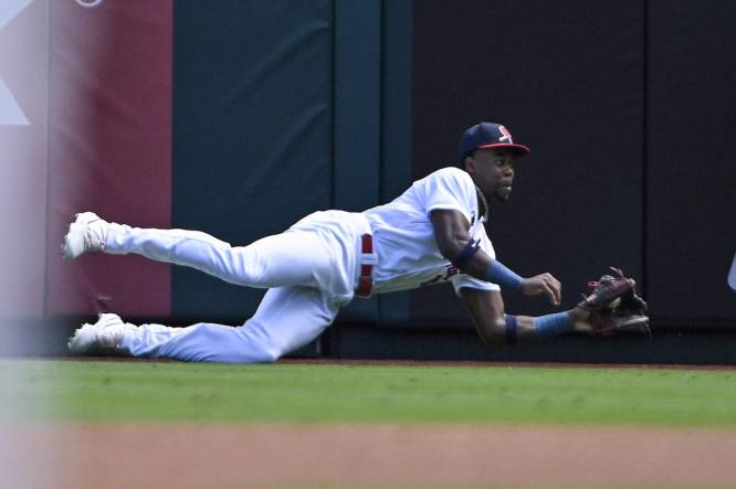 Sep 17, 2023; St. Louis, Missouri, USA;  St. Louis Cardinals right fielder Jordan Walker (18) dives and catches a line drive against the Philadelphia Phillies during the first inning at Busch Stadium. Mandatory Credit: Jeff Curry-USA TODAY Sports