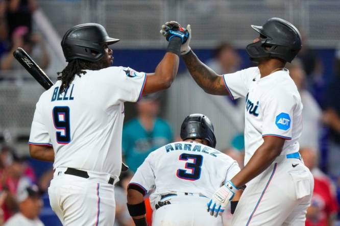 Sep 17, 2023; Miami, Florida, USA; Miami Marlins designated hitter Jorge Soler, right, celebrates with first baseman Josh Bell (9) after hitting a home run against the Atlanta Braves during the sixth inning at loanDepot Park. Mandatory Credit: Rich Storry-USA TODAY Sports