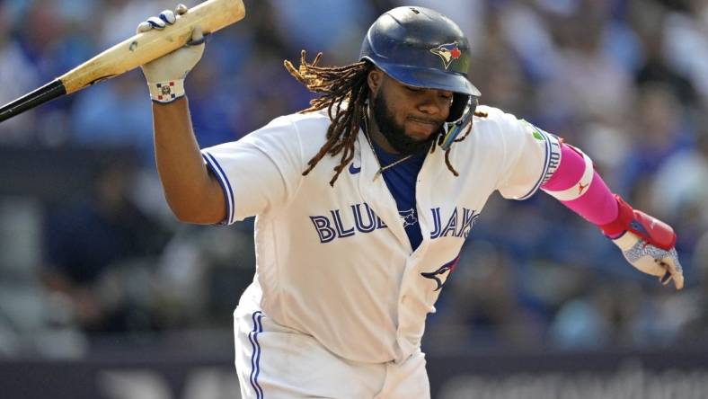 Sep 17, 2023; Toronto, Ontario, CAN; Toronto Blue Jays first baseman Vladimir Guerrero Jr. (27) reacts after flying out to the Boston Red Sox during the eighth inning at Rogers Centre. Mandatory Credit: John E. Sokolowski-USA TODAY Sports