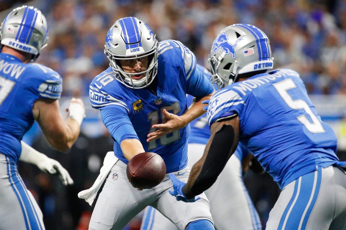 Detroit Lions quarterback Jared Goff (16) hands the ball to running back David Montgomery (5) against Seattle Seahawks during the first half at Ford Field in Detroit on Sunday, Sept. 17, 2023.