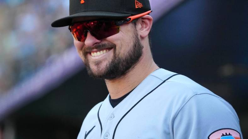 Sep 17, 2023; Denver, Colorado, USA;  San Francisco Giants third baseman J.D. Davis (7) reacts in the seventh inning against the Colorado Rockies at Coors Field. Mandatory Credit: Ron Chenoy-USA TODAY Sports