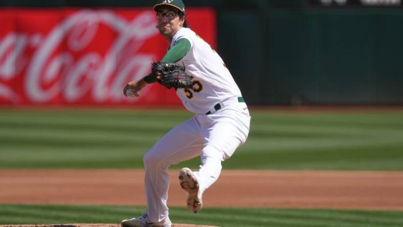 Sep 17, 2023; Oakland, California, USA; Oakland Athletics starting pitcher Joe Boyle (35) throws a pitch against the San Diego Padres during the third inning at Oakland-Alameda County Coliseum. Mandatory Credit: Darren Yamashita-USA TODAY Sports