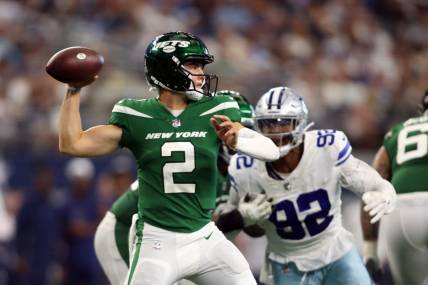 Sep 17, 2023; Arlington, Texas, USA; New York Jets quarterback Zach Wilson (2) throws a pass in the third quarter against the Dallas Cowboys at AT&T Stadium. Mandatory Credit: Tim Heitman-USA TODAY Sports