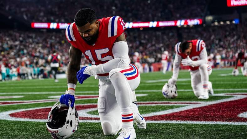 Sep 17, 2023; Foxborough, Massachusetts, USA; New England Patriots running back Ezekiel Elliott (15) on the field before the game against the Miami Dolphins at Gillette Stadium. Mandatory Credit: David Butler II-USA TODAY Sports