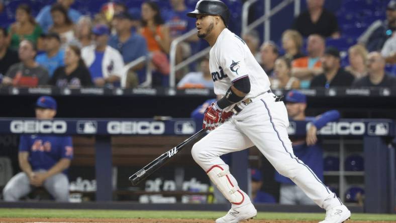 Sep 18, 2023; Miami, Florida, USA; Miami Marlins second baseman Luis Arraez (3) gets his 200th hit on the season against  the New York Mets at loanDepot Park. Mandatory Credit: Rhona Wise-USA TODAY Sports