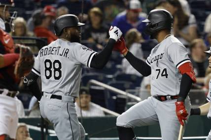 Sep 18, 2023; Washington, District of Columbia, USA; Chicago White Sox center fielder Luis Robert Jr. (88) celebrates with White Sox designated hitter Eloy Jimenez (74) after hitting a three run home run against the Washington Nationals during the fifth inning at Nationals Park. Mandatory Credit: Geoff Burke-USA TODAY Sports