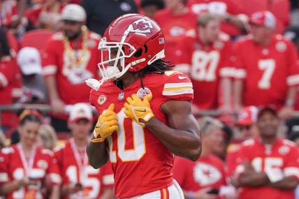 Sep 7, 2023; Kansas City, Missouri, USA; Kansas City Chiefs running back Isiah Pacheco (10) warms up against the Detroit Lions prior to a game at GEHA Field at Arrowhead Stadium. Mandatory Credit: Denny Medley-USA TODAY Sports