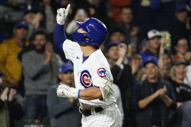 Sep 19, 2023; Chicago, Illinois, USA; Chicago Cubs right fielder Seiya Suzuki (27) gestures after hitting a home run against the Pittsburgh Pirates during the third inning at Wrigley Field. Mandatory Credit: David Banks-USA TODAY Sports