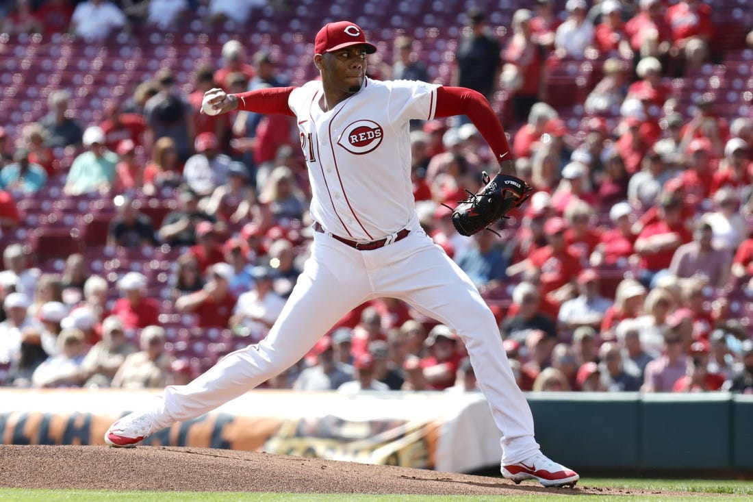 Sep 20, 2023; Cincinnati, Ohio, USA; Cincinnati Reds starting pitcher Hunter Greene (21) throws against the Minnesota Twins during the first inning at Great American Ball Park. Mandatory Credit: David Kohl-USA TODAY Sports