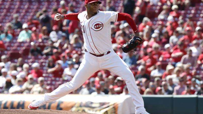 Sep 20, 2023; Cincinnati, Ohio, USA; Cincinnati Reds starting pitcher Hunter Greene (21) throws against the Minnesota Twins during the first inning at Great American Ball Park. Mandatory Credit: David Kohl-USA TODAY Sports