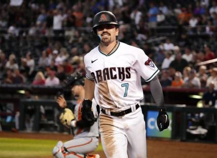 Arizona Diamondbacks rookie Corbin Carroll (7) smiles after hitting his 25th home run against the San Francisco Giants in the seventh inning at Chase Field in Phoenix on Sept. 20, 2023.