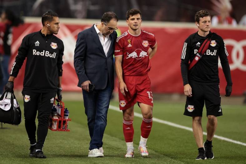 Sep 20, 2023; Harrison, New Jersey, USA; New York Red Bulls forward Dante Vanzeir (13) walks with medical staff in the first half against the Austin FC at Red Bull Arena. Mandatory Credit: Vincent Carchietta-USA TODAY Sports