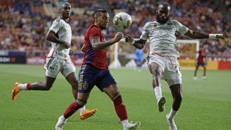 Sep 20, 2023; Sandy, Utah, USA; FC Dallas defender Sebastien Ibeagha (25) clears the ball from Real Salt Lake forward Chicho Arango (9) in the first half at America First Field. Mandatory Credit: Jeff Swinger-USA TODAY Sports