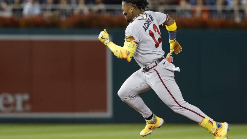 Sep 21, 2023; Washington, District of Columbia, USA; Atlanta Braves right fielder Ronald Acuna Jr. (13) rounds the bases after hitting a triple against the Washington Nationals during the third inning at Nationals Park. Mandatory Credit: Geoff Burke-USA TODAY Sports