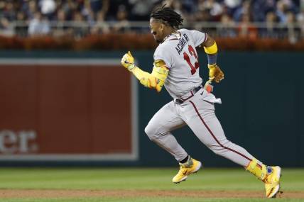 Sep 21, 2023; Washington, District of Columbia, USA; Atlanta Braves right fielder Ronald Acuna Jr. (13) rounds the bases after hitting a triple against the Washington Nationals during the third inning at Nationals Park. Mandatory Credit: Geoff Burke-USA TODAY Sports