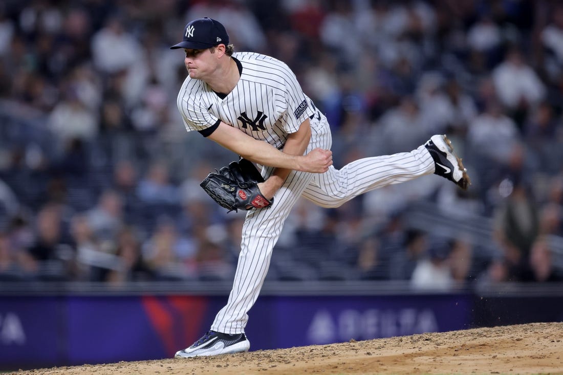 Sep 21, 2023; Bronx, New York, USA; New York Yankees starting pitcher Gerrit Cole (45) follows through on a pitch against the Toronto Blue Jays during the fifth inning at Yankee Stadium. Mandatory Credit: Brad Penner-USA TODAY Sports