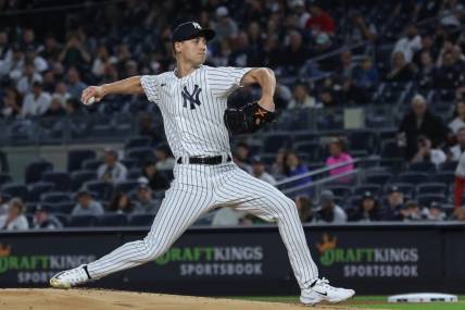 Sep 22, 2023; Bronx, New York, USA; New York Yankees starting pitcher Luke Weaver (30) delivers a pitch during the first inning against the Arizona Diamondbacks at Yankee Stadium. Mandatory Credit: Vincent Carchietta-USA TODAY Sports