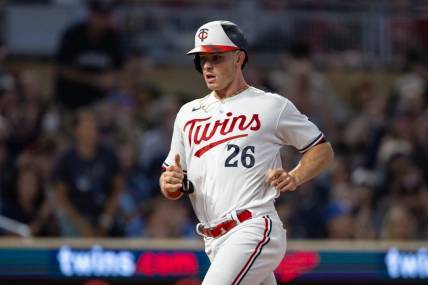 Sep 22, 2023; Minneapolis, Minnesota, USA; Minnesota Twins right fielder Max Kepler (26) scores during the second inning against the Los Angeles Angels at Target Field. Mandatory Credit: Jordan Johnson-USA TODAY Sports