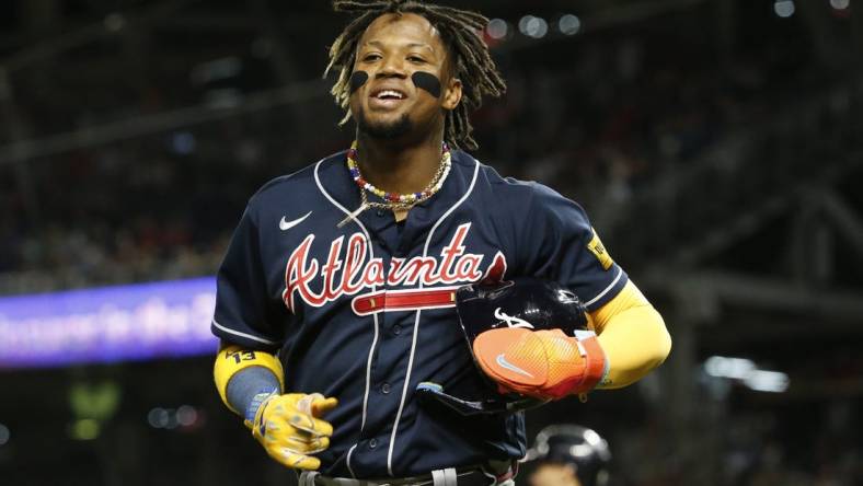 Sep 22, 2023; Washington, District of Columbia, USA; Atlanta Braves right fielder Ronald Acuna Jr. (13) celebrates after scoring a run in the fifth inning against the Washington Nationals at Nationals Park. Mandatory Credit: Amber Searls-USA TODAY Sports