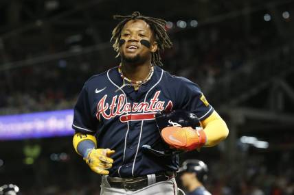 Sep 22, 2023; Washington, District of Columbia, USA; Atlanta Braves right fielder Ronald Acuna Jr. (13) celebrates after scoring a run in the fifth inning against the Washington Nationals at Nationals Park. Mandatory Credit: Amber Searls-USA TODAY Sports