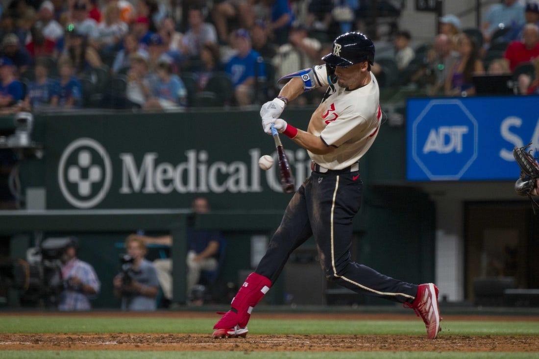 Sep 22, 2023; Arlington, Texas, USA; Texas Rangers center fielder left Carter (32) bats against the Seattle Mariners during the game at Globe Life Field. Mandatory Credit: Jerome Miron-USA TODAY Sports