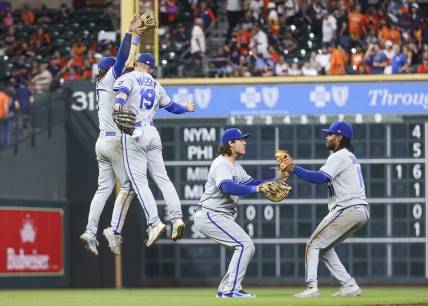 Sep 22, 2023; Houston, Texas, USA; Kansas City Royals first baseman Nick Pratto (32) and second baseman Michael Massey (19) leap to celebrate after the game against the Houston Astros at Minute Maid Park. Mandatory Credit: Troy Taormina-USA TODAY Sports