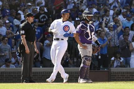 Sep 23, 2023; Chicago, Illinois, USA; Chicago Cubs right fielder Seiya Suzuki (27) scores against the Colorado Rockies during the sixth inning at Wrigley Field. Mandatory Credit: Matt Marton-USA TODAY Sports