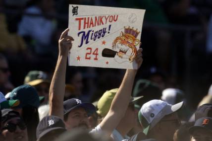 Sep 23, 2023; Oakland, California, USA; A fan holds up a sign acknowledging Detroit Tigers designated hitter Miguel Cabrera during the eighth inning against the Oakland Athletics at Oakland-Alameda County Coliseum. Cabrera is retiring after 21 Major League seasons. Mandatory Credit: D. Ross Cameron-USA TODAY Sports