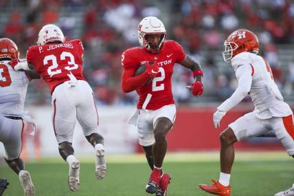 Sep 23, 2023; Houston, Texas, USA; Houston Cougars wide receiver Matthew Golden (2) runs with the ball during the first quarter against the Sam Houston State Bearkats at TDECU Stadium. Mandatory Credit: Troy Taormina-USA TODAY Sports